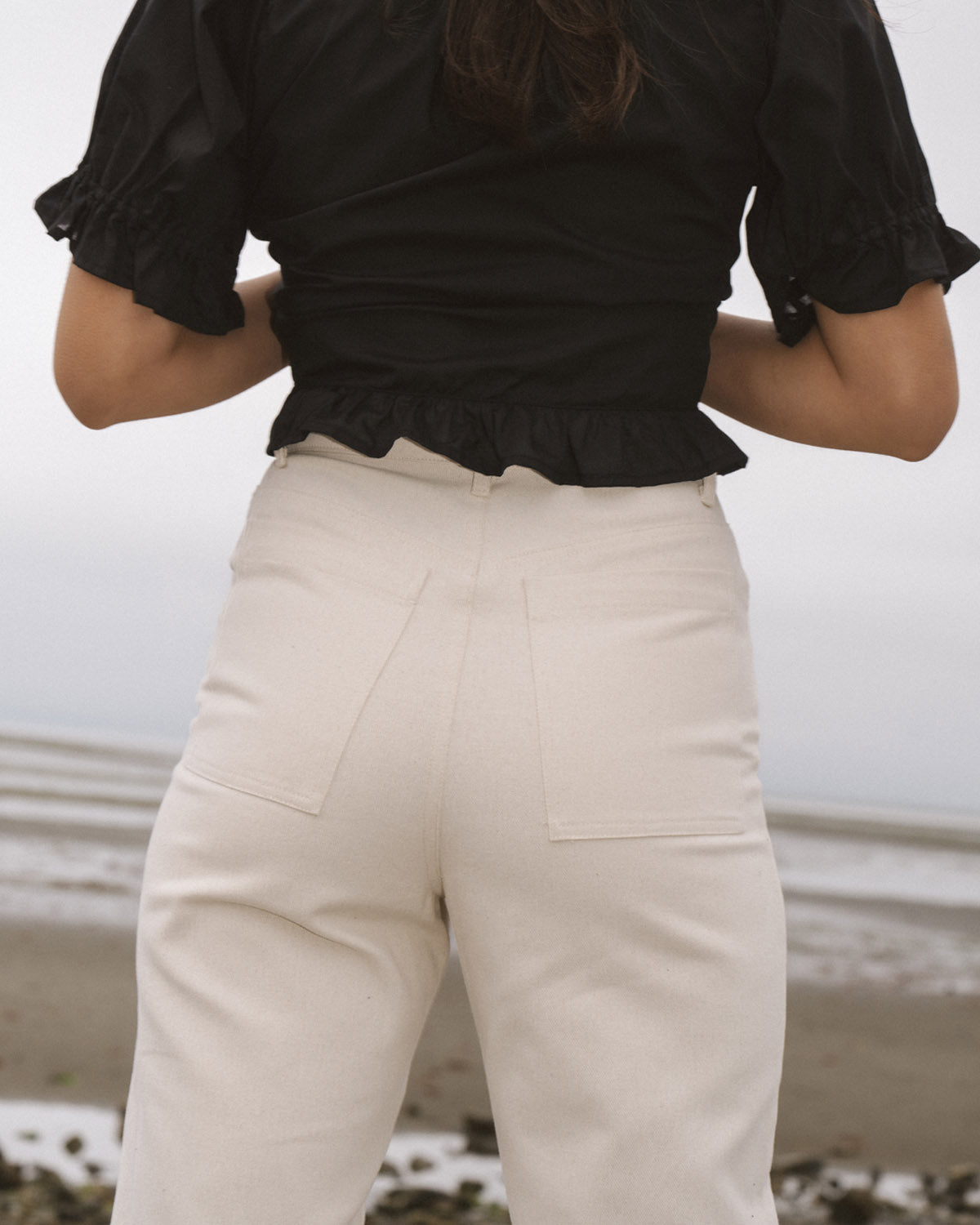 off-white straight leg pants with front and back pockets