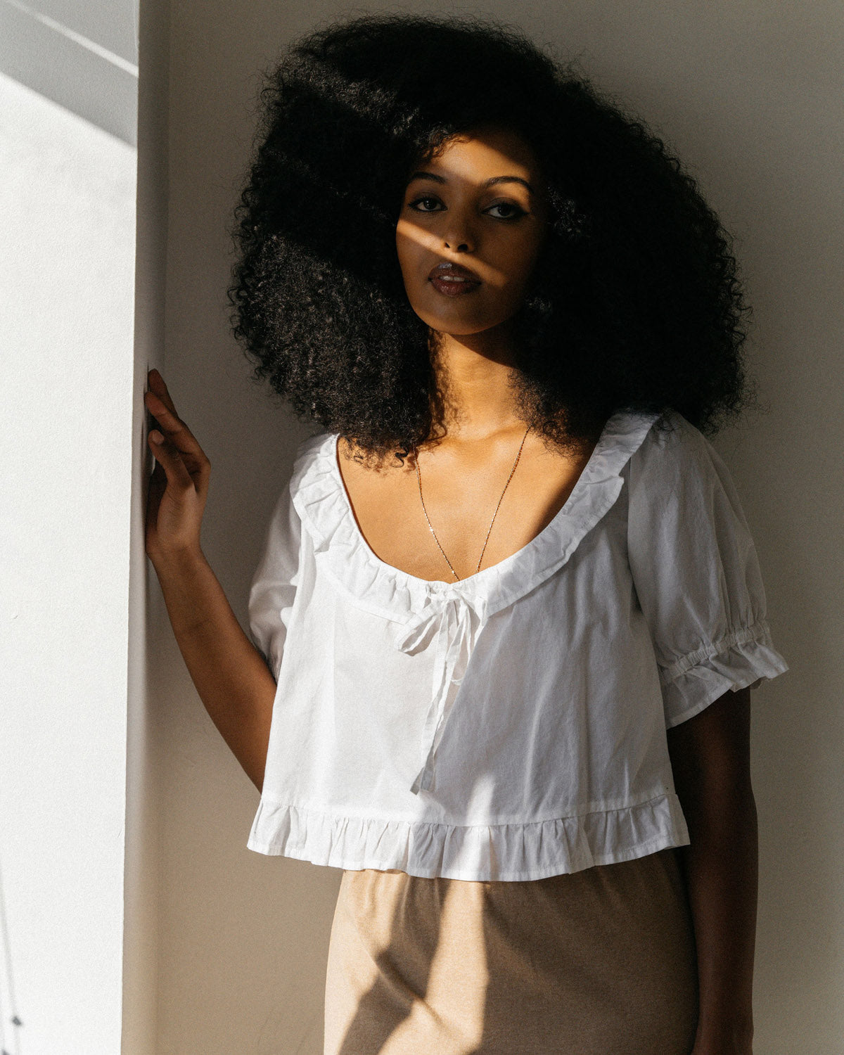 delicate, short-sleeve girly blouse with frills