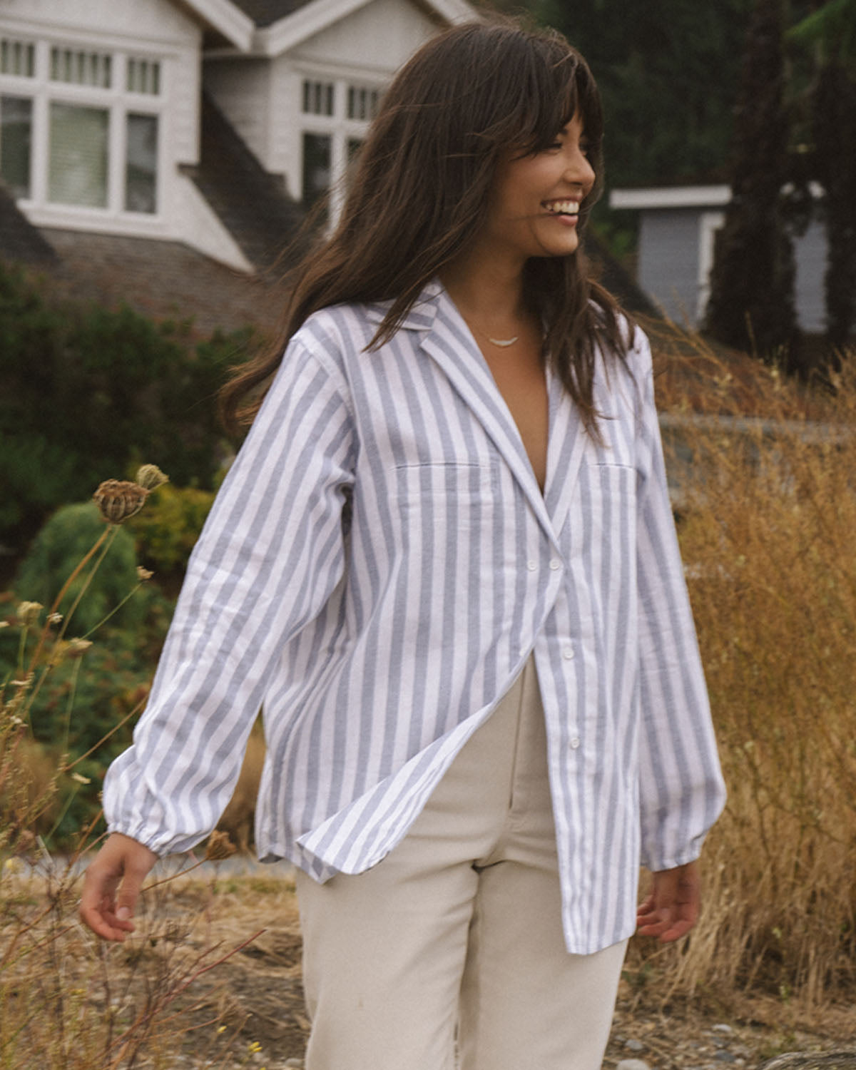 vertical stripe blue and white button up blouse made from a linen and cotton blend