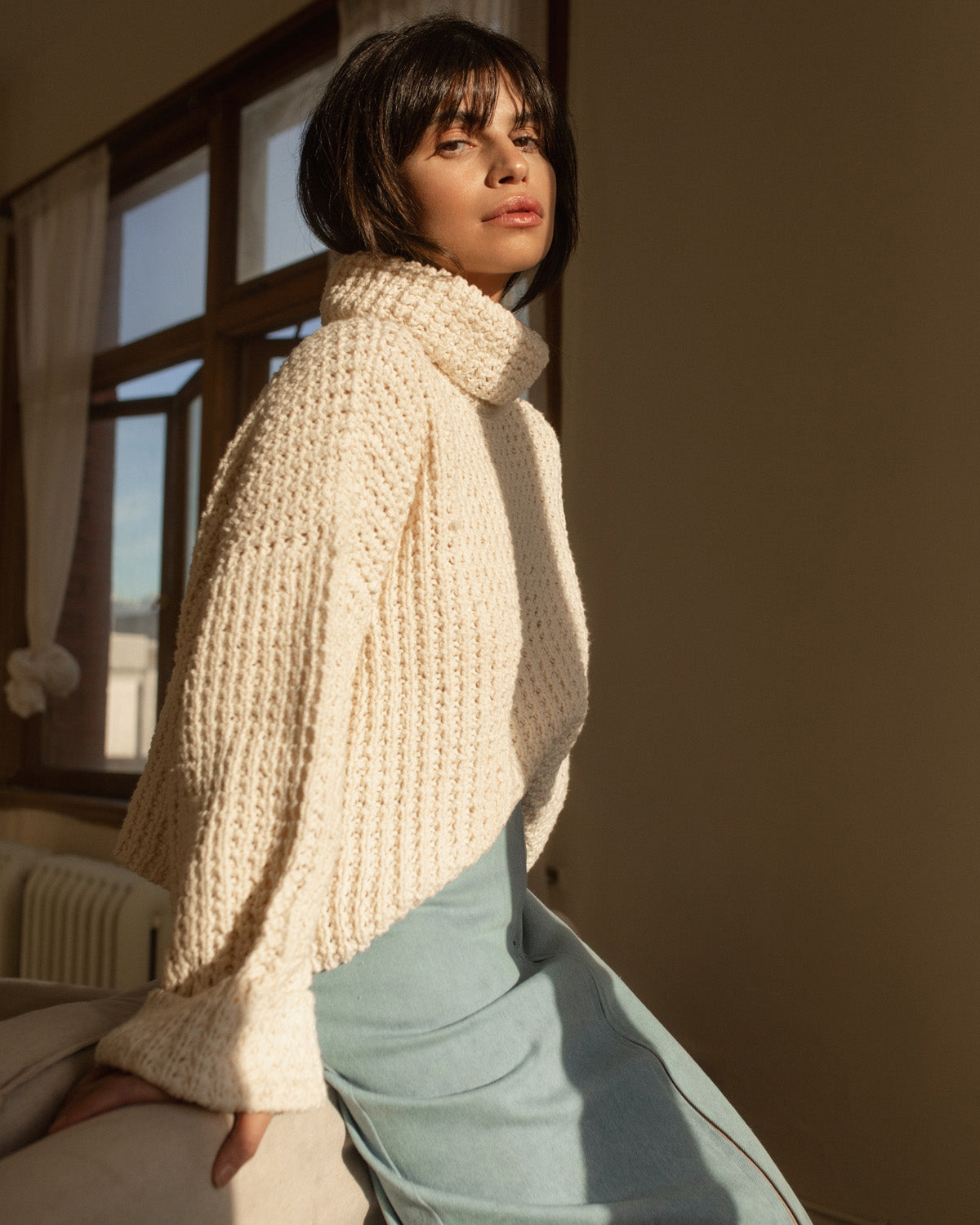 cream mockneck sweater made from cotton, wide sleeves