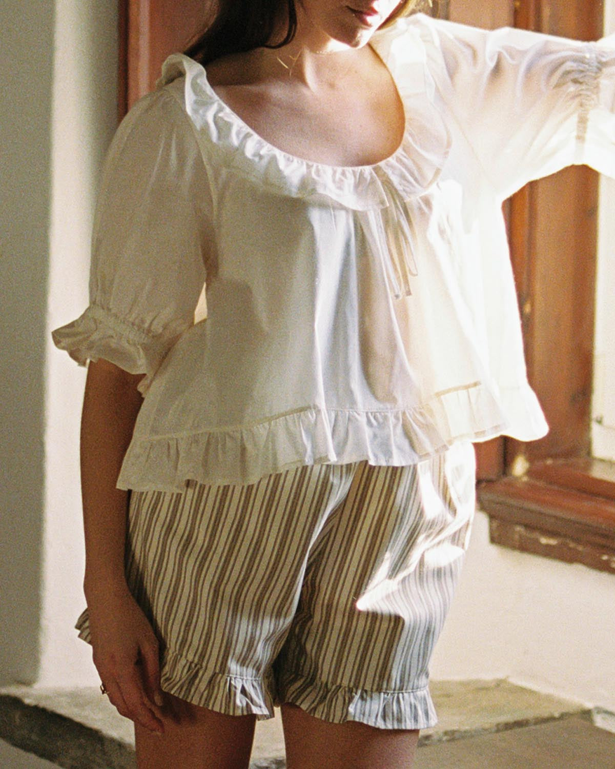 brown and beige striped shorts with elastic waistband