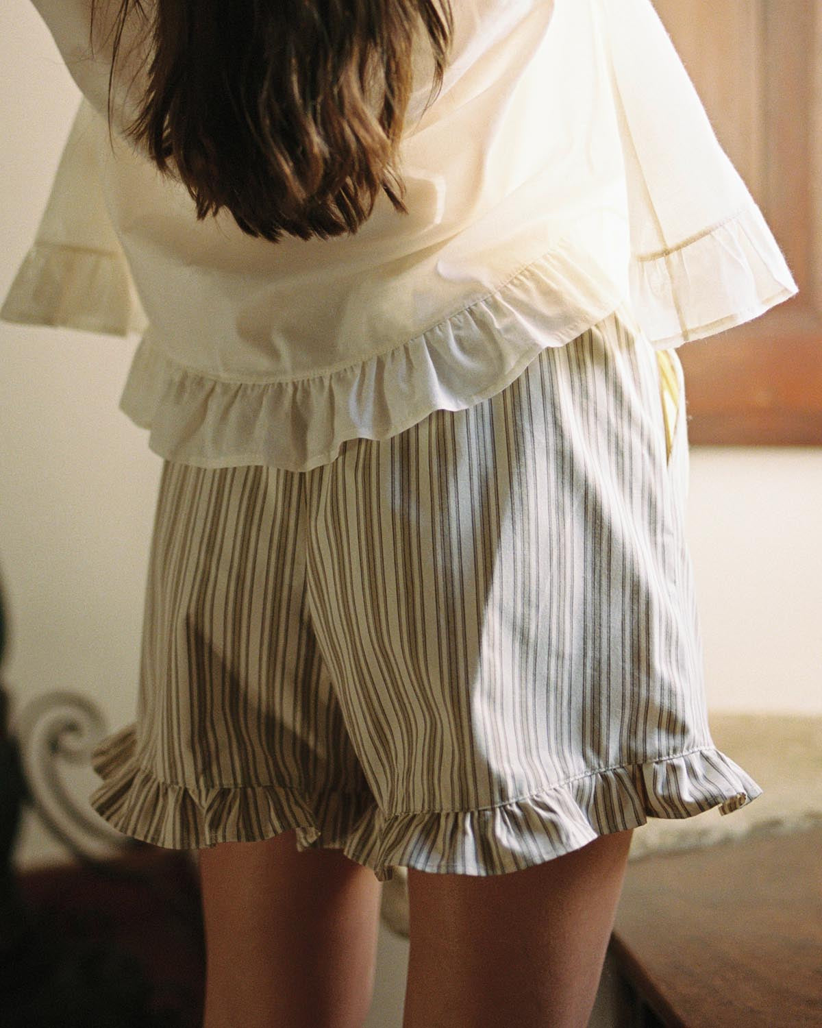 brown and beige striped shorts with elastic waistband