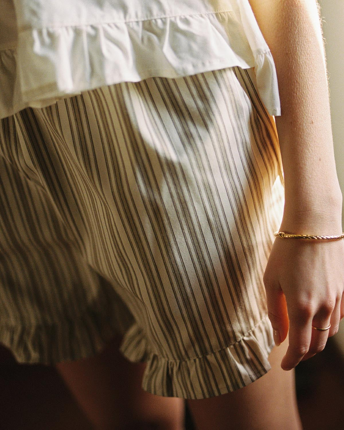 brown and beige striped shorts with elastic waistband