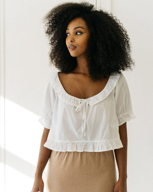 delicate, short-sleeve girly blouse with frills