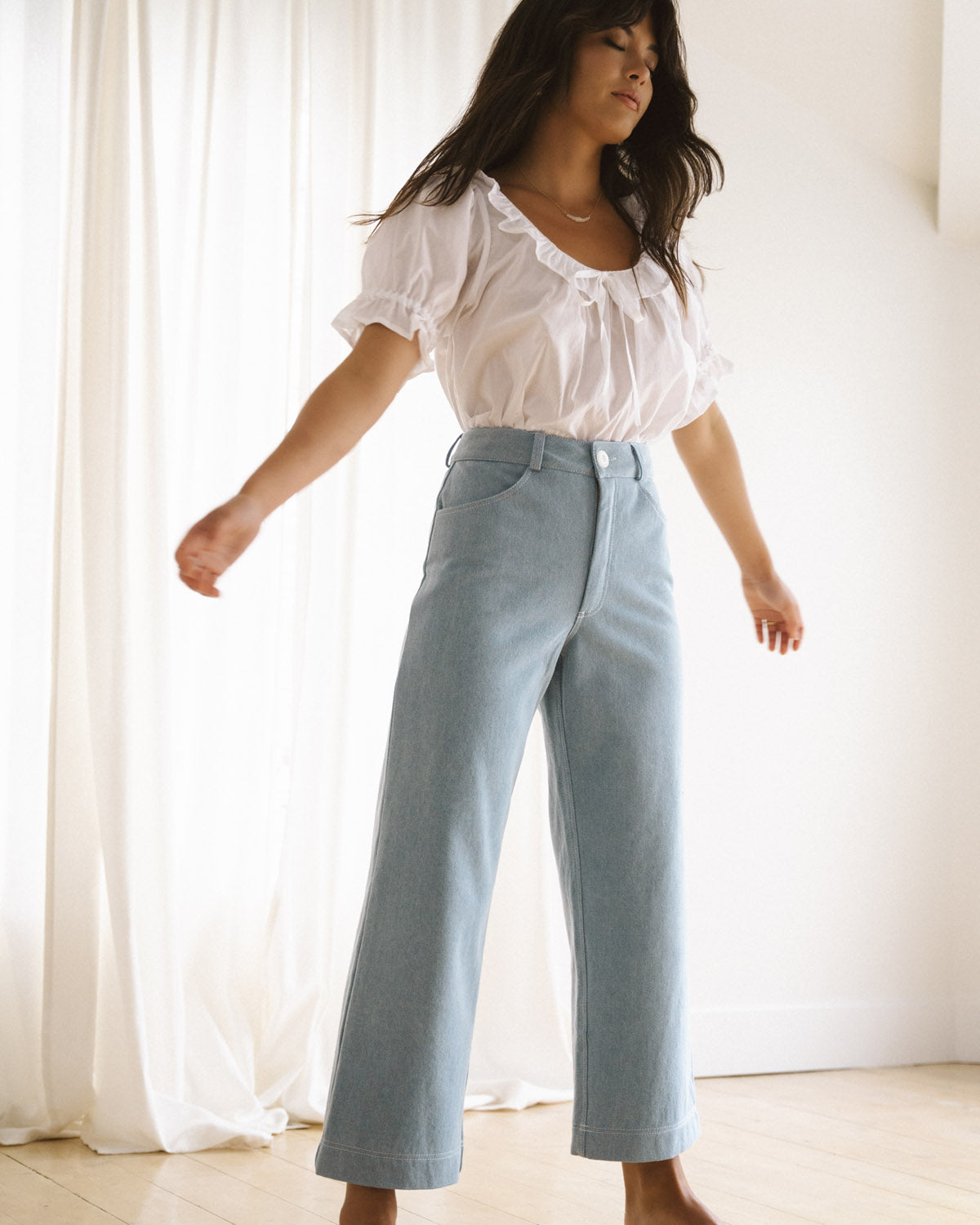 light denim wide-leg crop pants with belt loops and front pockets