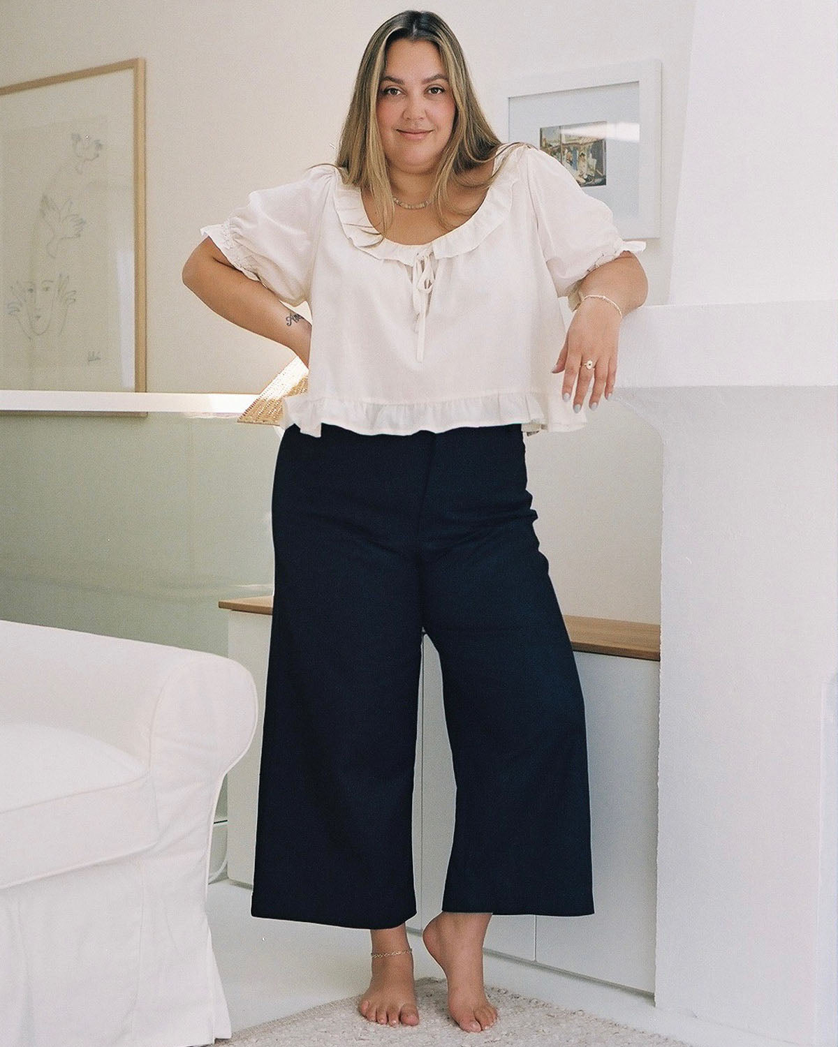 high-waisted navy pants with front pockets and belt loops