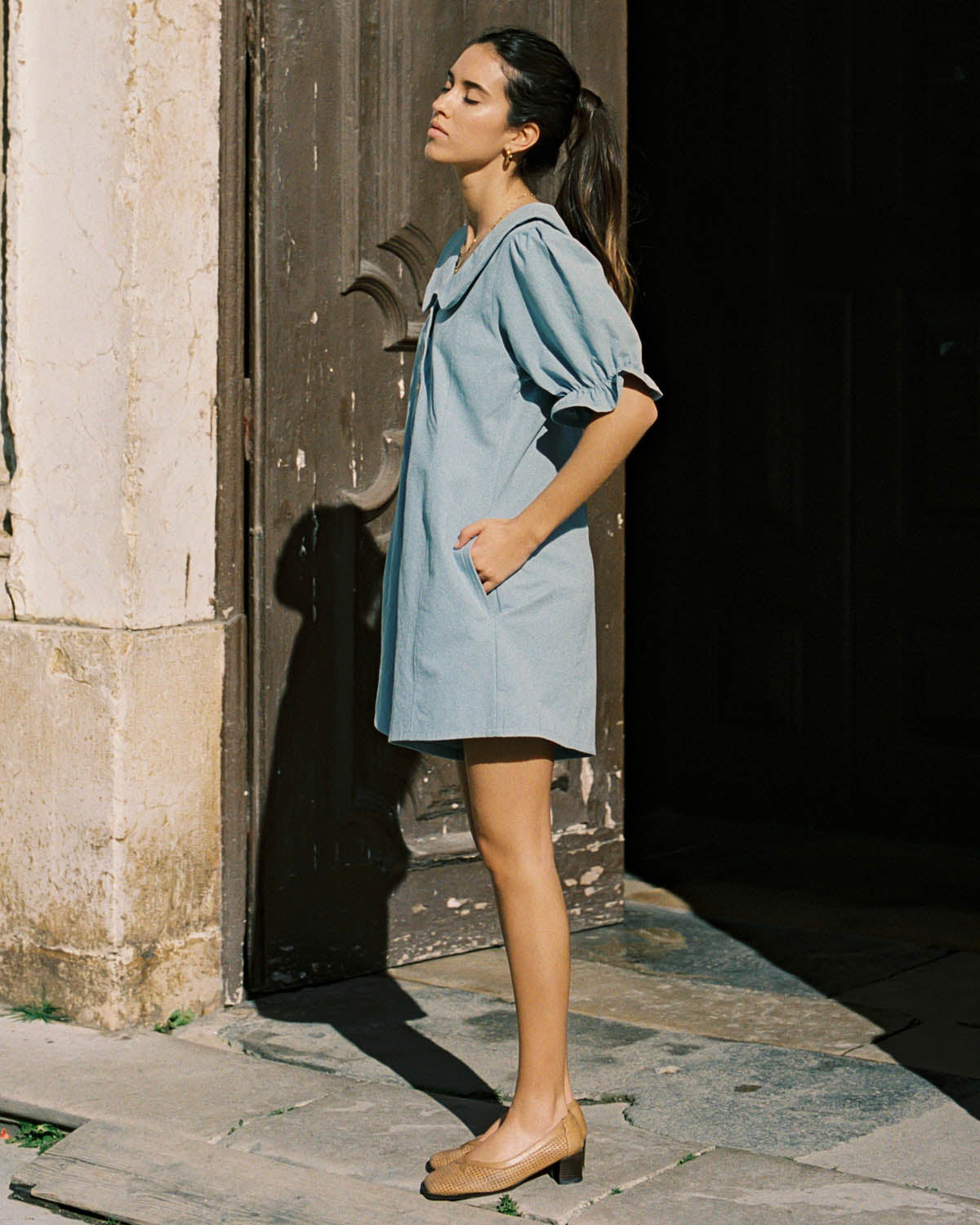 baby blue organic cotton romper with peter pan collar and puff sleeve