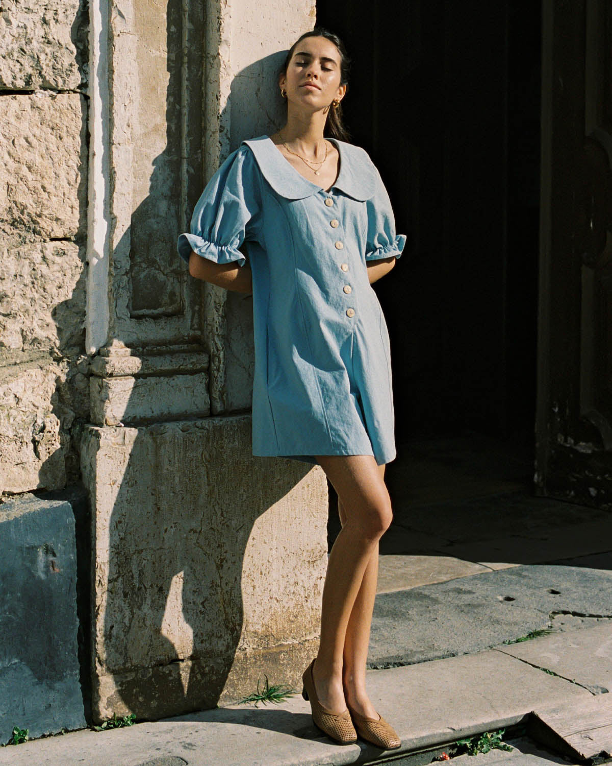 baby blue organic cotton romper with peter pan collar and puff sleeve