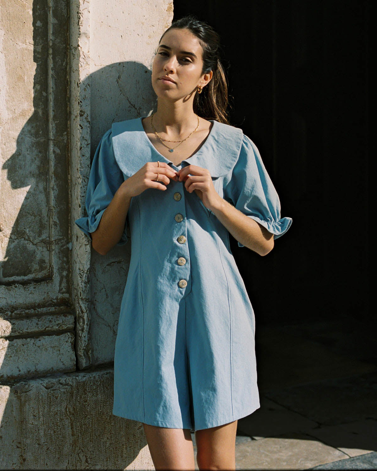 baby blue organic cotton romper with peter pan collar and puff sleeve