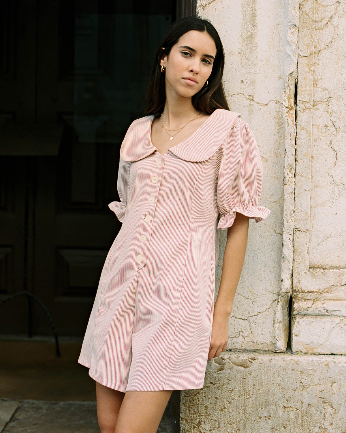 red pinstripe romper with peter pan collar and puff sleeve