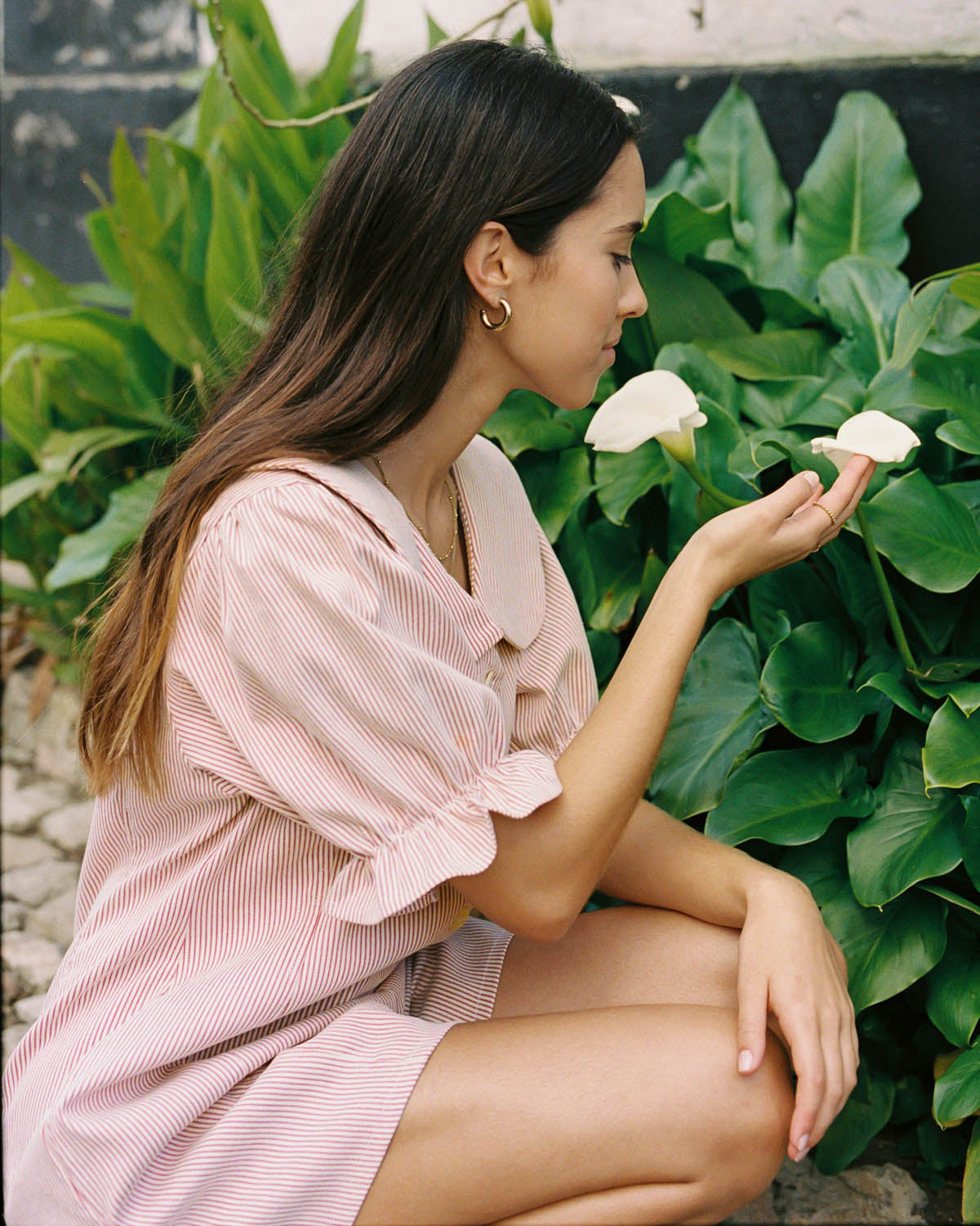 red pinstripe romper with peter pan collar and puff sleeve