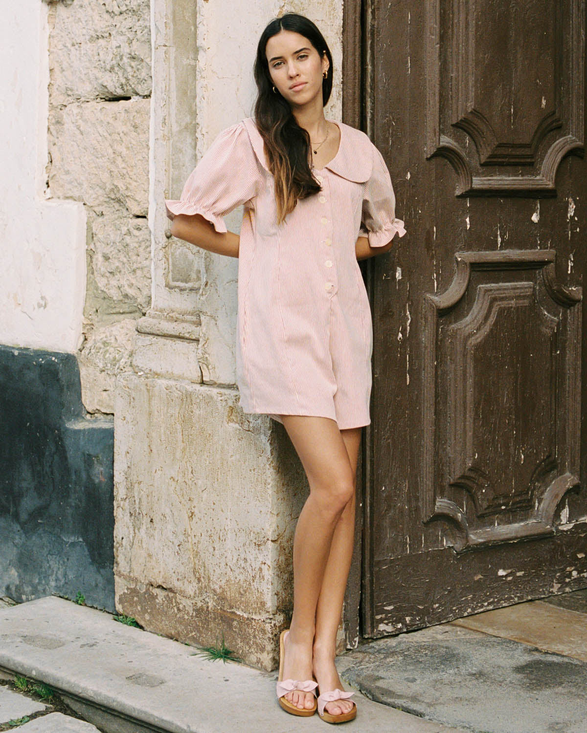 red pinstripe romper with peter pan collar and puff sleeve