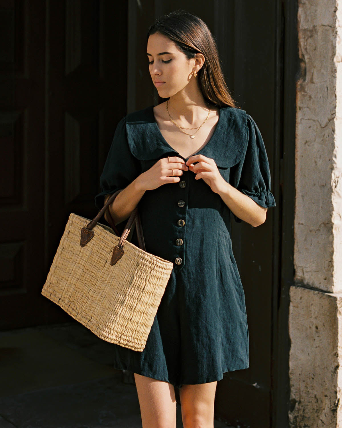 black linen romper with peter pan collar and puff sleeve