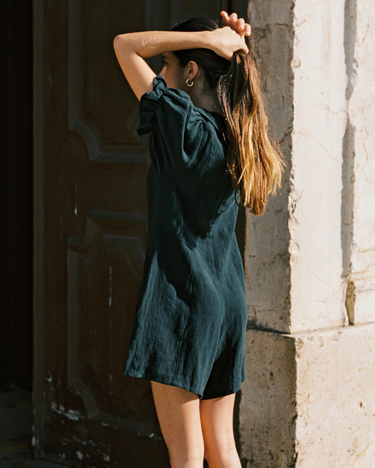 black linen romper with peter pan collar and puff sleeve