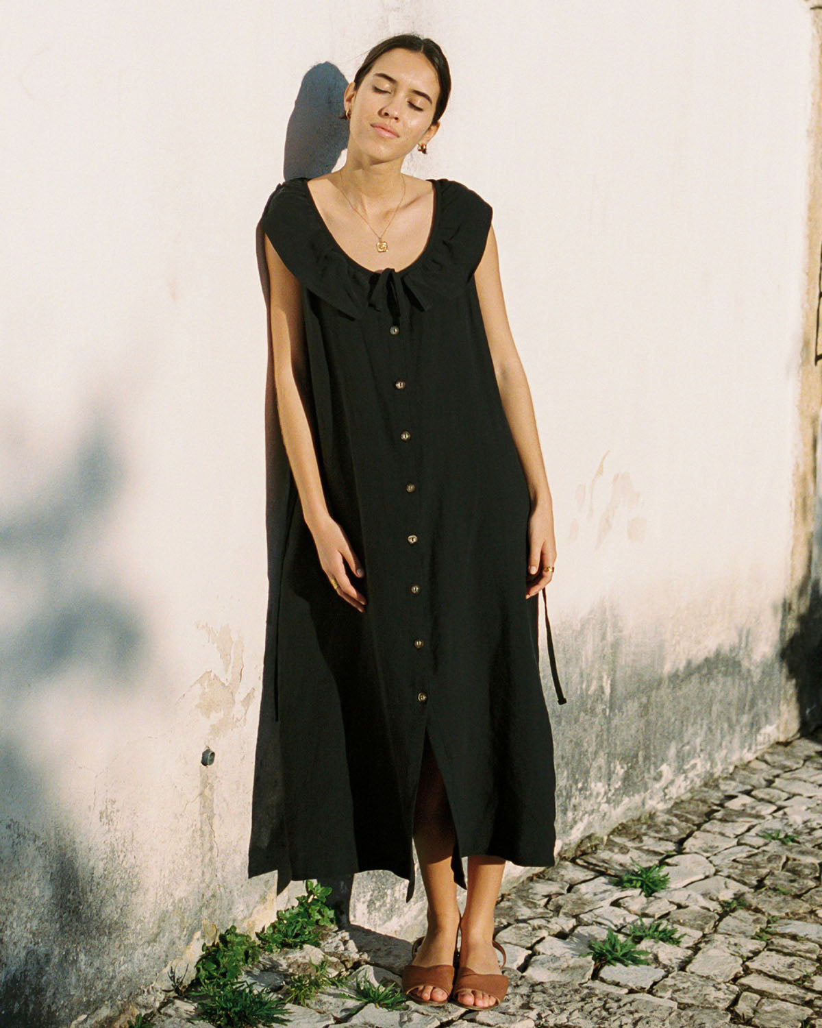 black sleeveless button front linen dress with ties