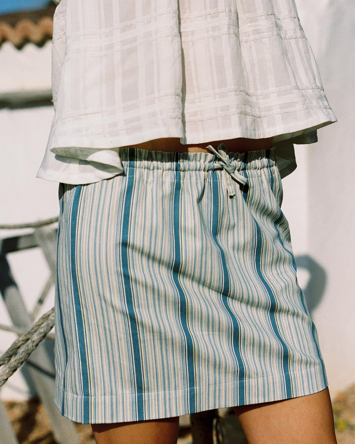 beige and blue striped mini skirt with elastic tie waistband