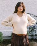 cream knit sweater made from 100% cotton