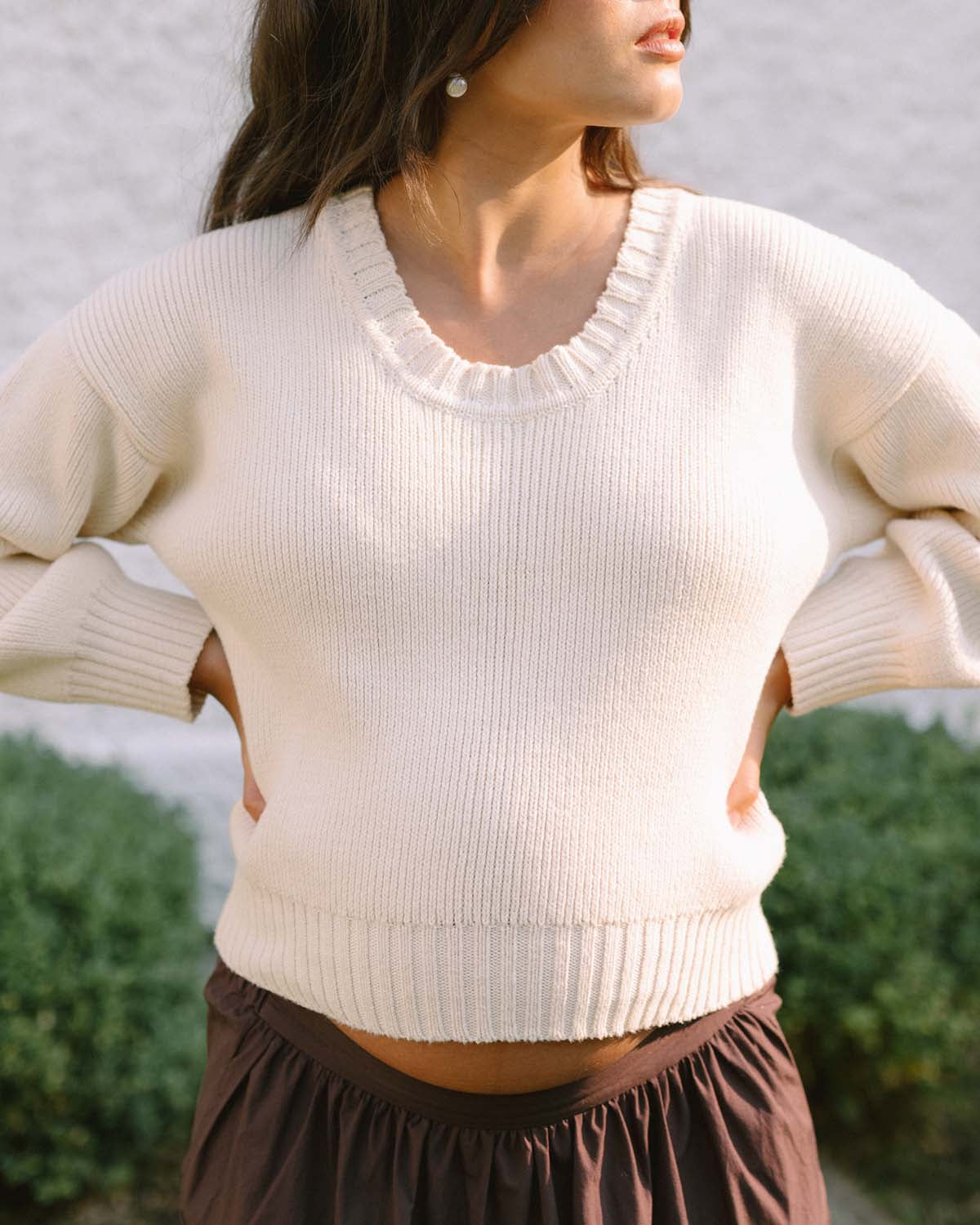 cream knit sweater made from 100% cotton