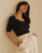 black t-shirt with wide neckline and longer sleeves