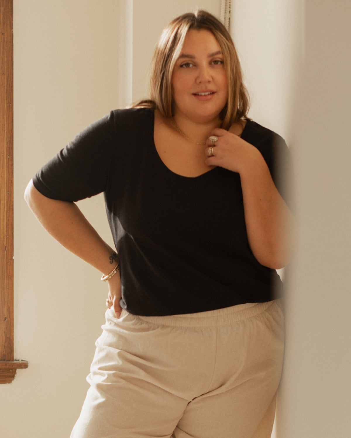 black t-shirt with wide neckline and longer sleeves