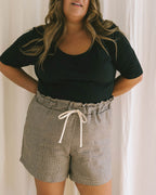 black t-shirt with wide neckline and longer sleeves