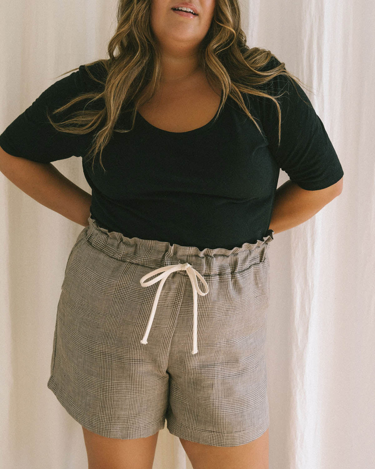 black t-shirt with wide neckline and longer sleeves