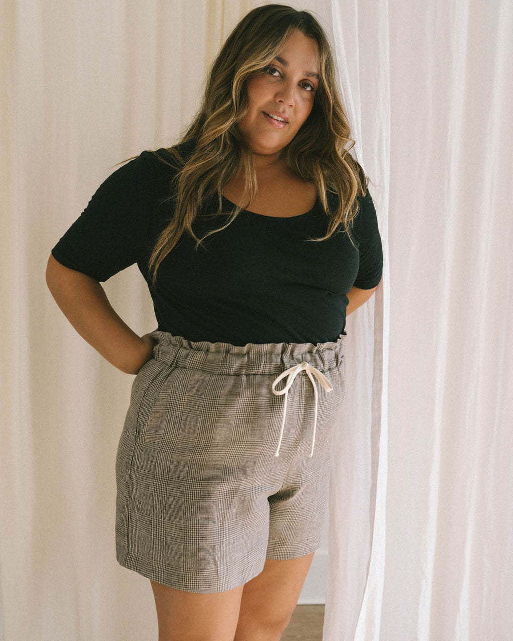 black t-shirt with wide neckline and longer sleeves