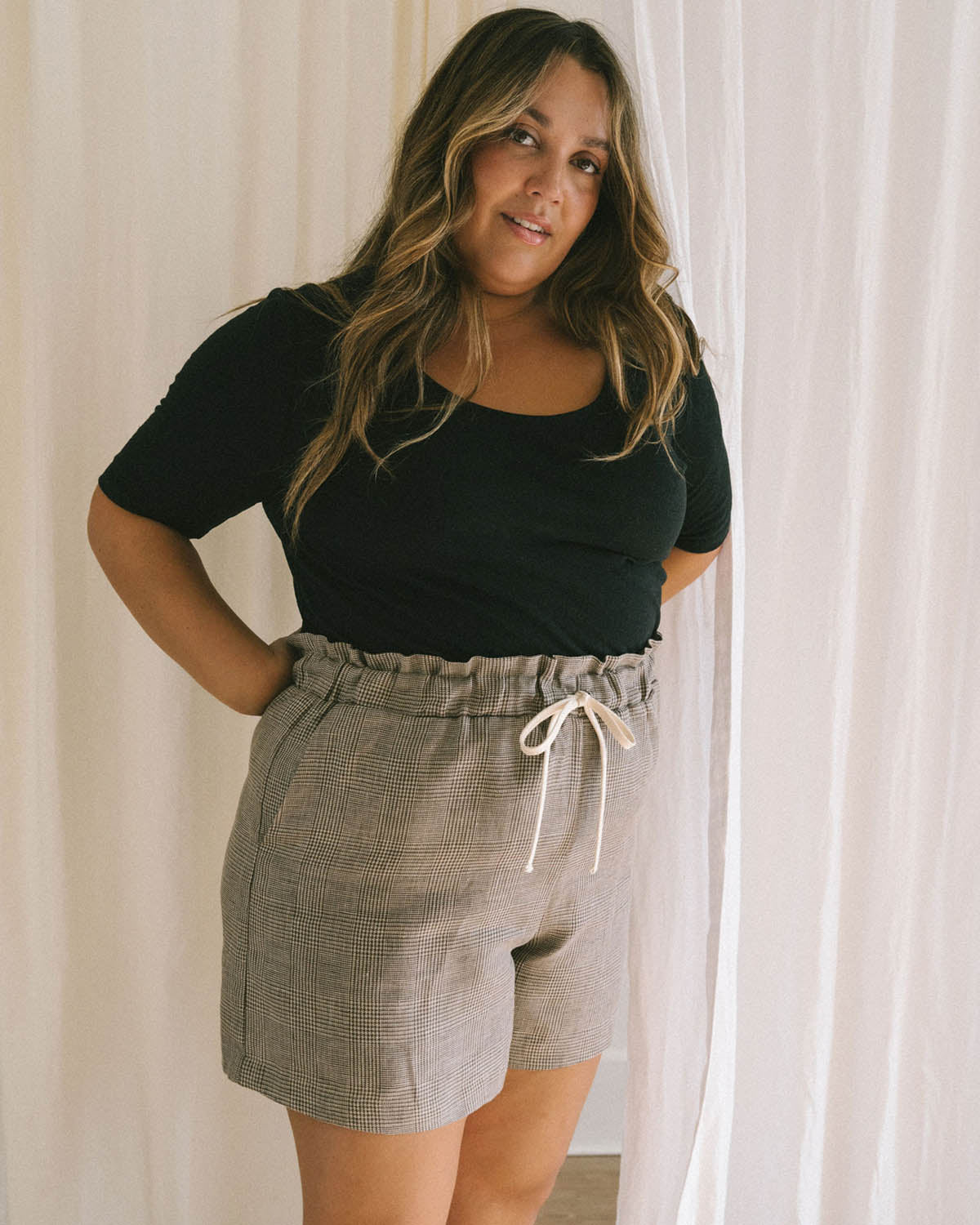 black t-shirt with wide neckline and longer sleeves