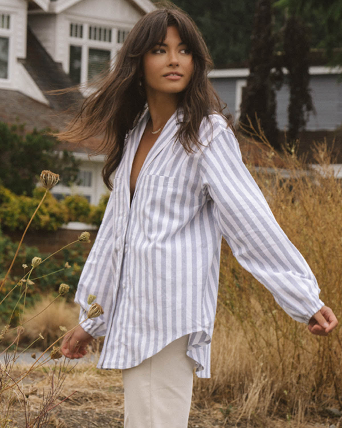 vertical stripe blue and white button up blouse made from a linen and cotton blend