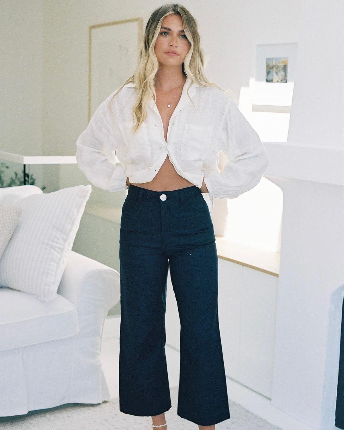 high-waisted navy pants with front pockets and belt loops