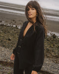 Black button-up made from raw silk