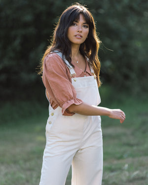 cream-coloured overalls made from 100% cotton
