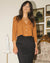 3/4 sleeve rust coloured blouse with button front, made from 100% organic cotton