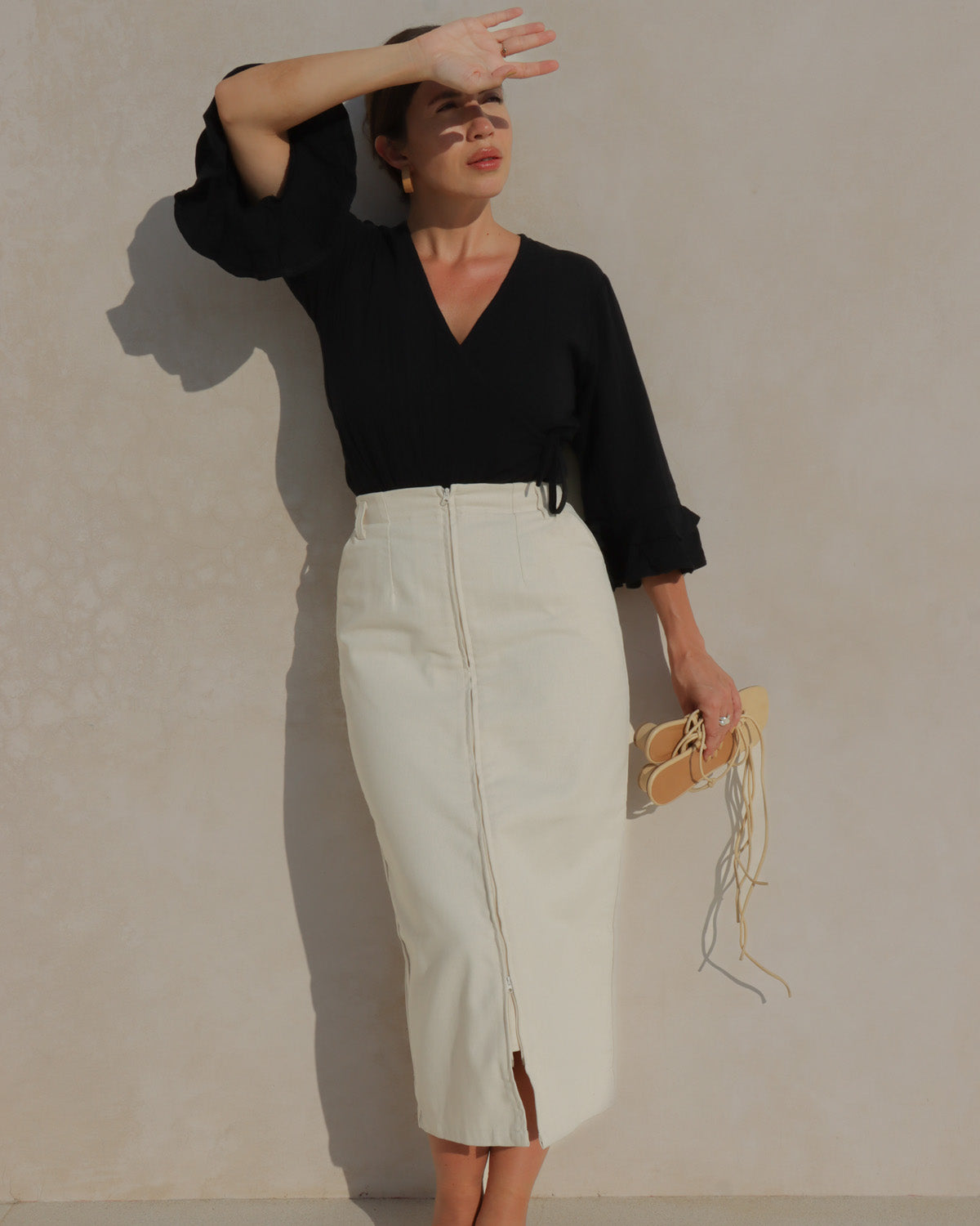creamy white pencil skirt with zipper front with pockets