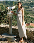 light blue and white striped dress made from a blend of linen and cotton