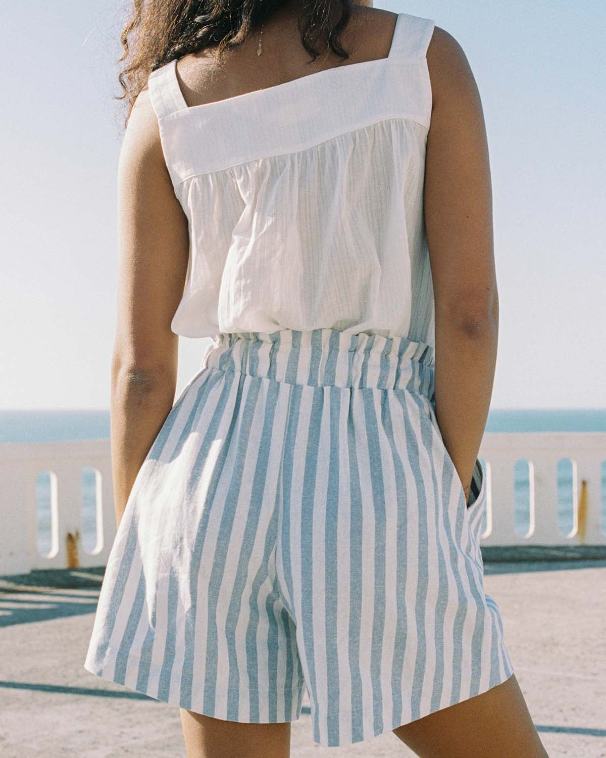 blue and white striped paperbag waist shorts with drawstring and pockets