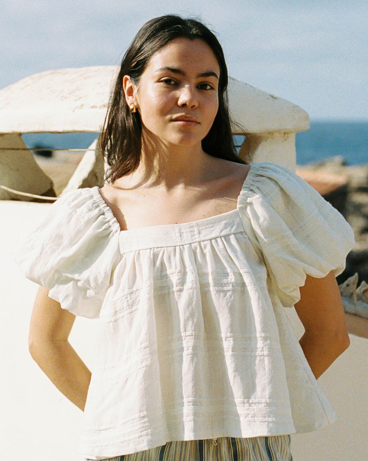 white cotton blouse with puff sleeves