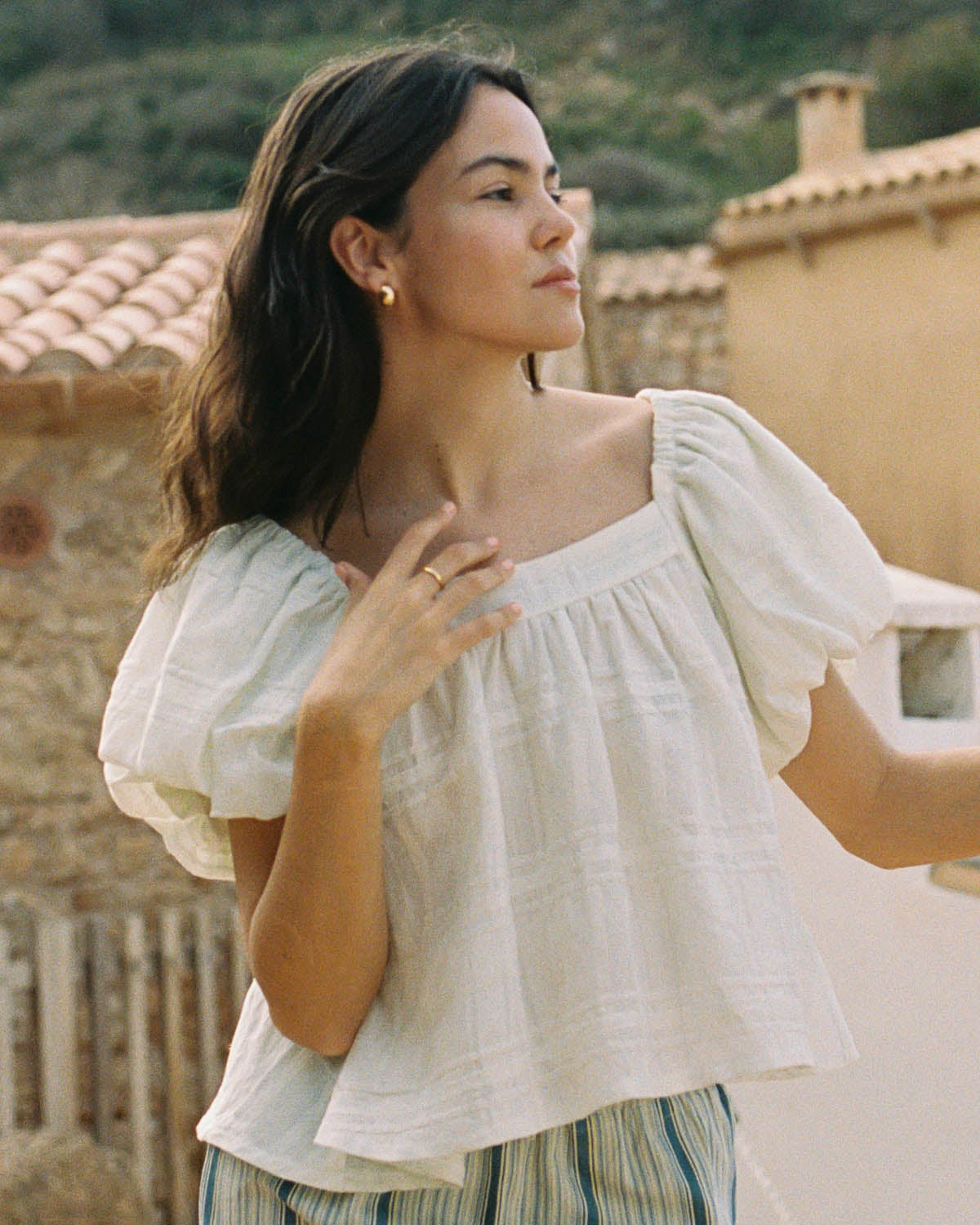 white cotton blouse with puff sleeves