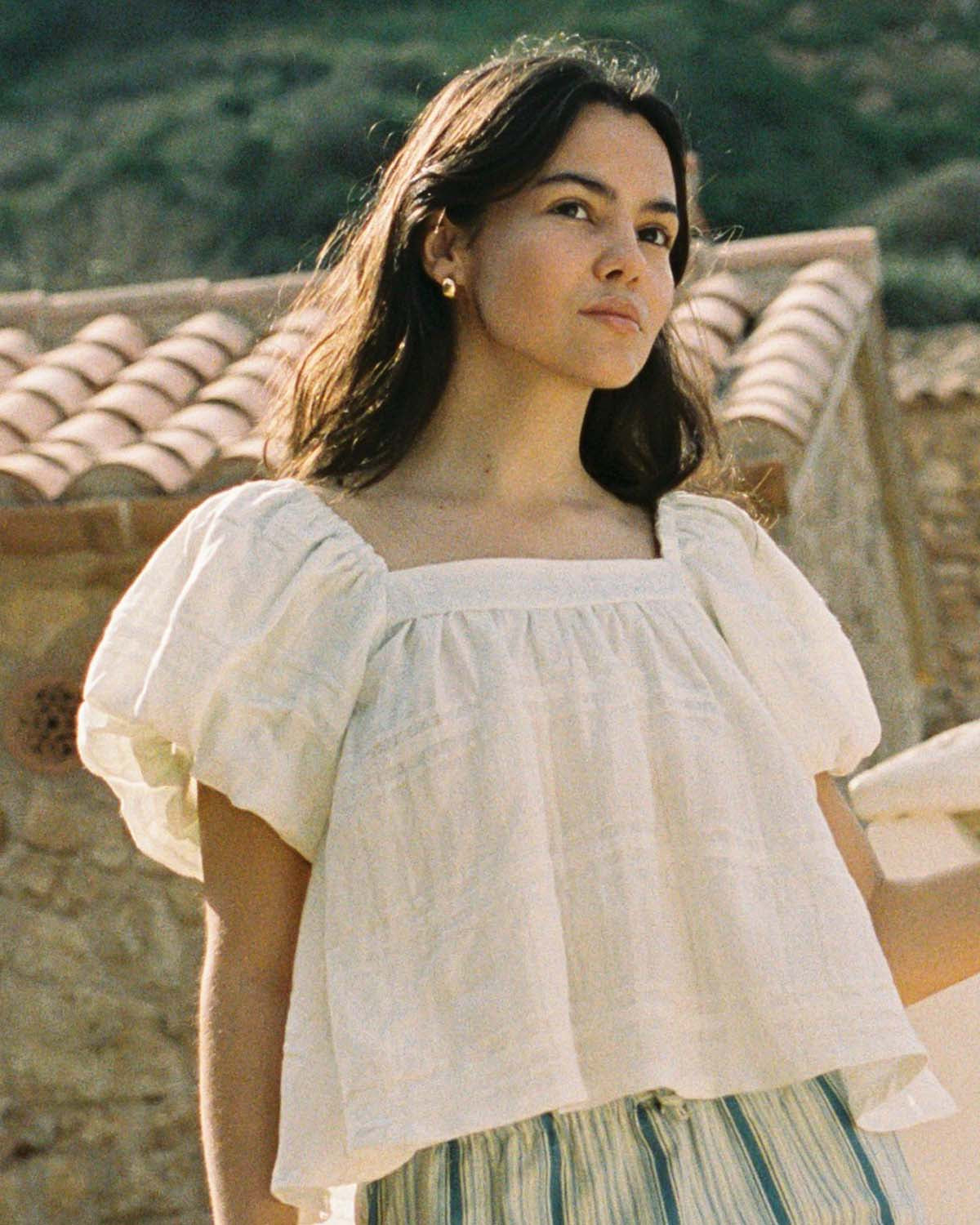 white cotton blouse with puff sleeves