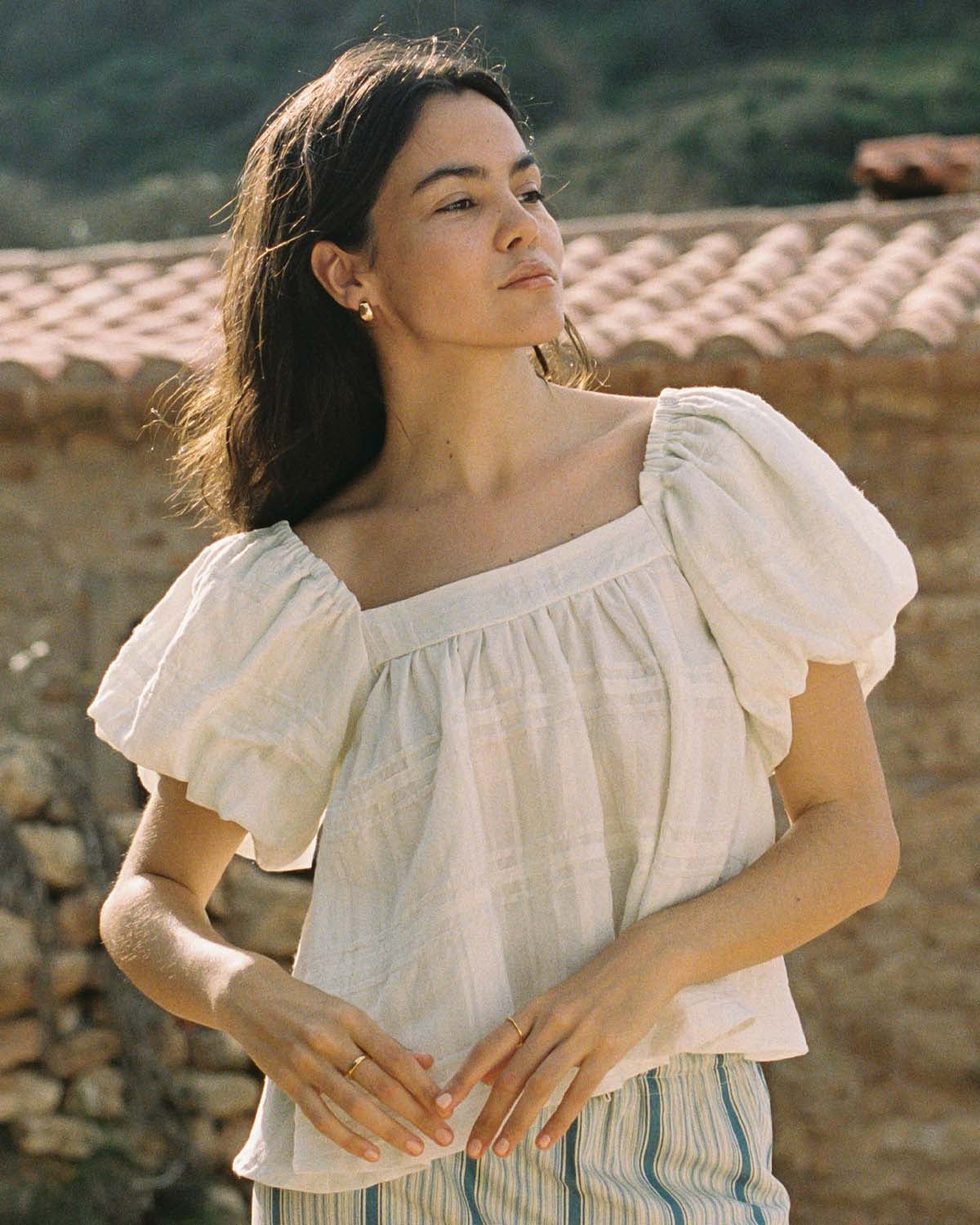 white cotton blouse with puff sleeves