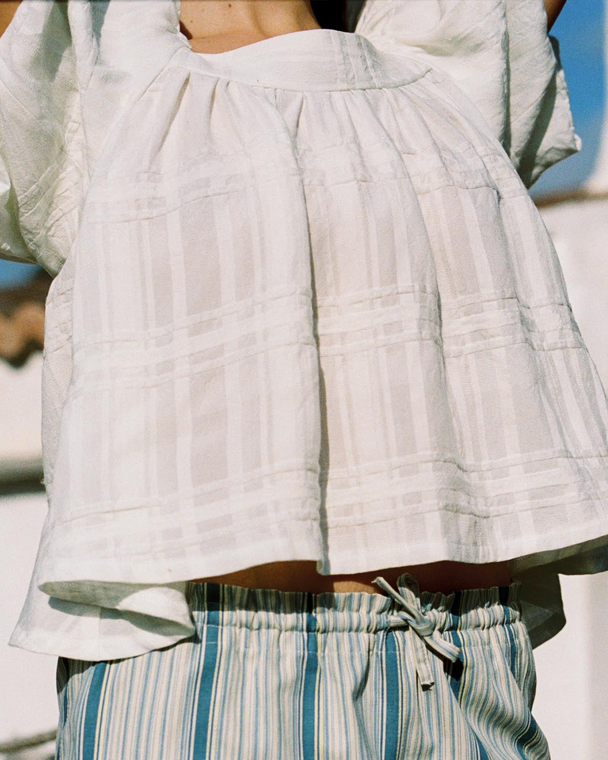 white cotton blouse with puff sleeves