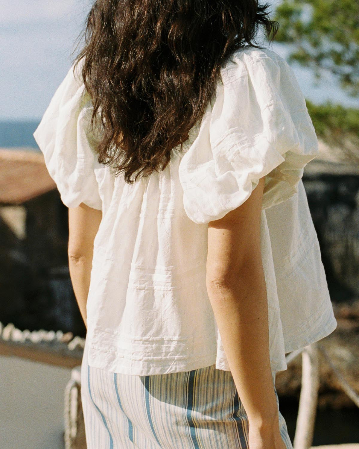 white cotton blouse with puff sleeves