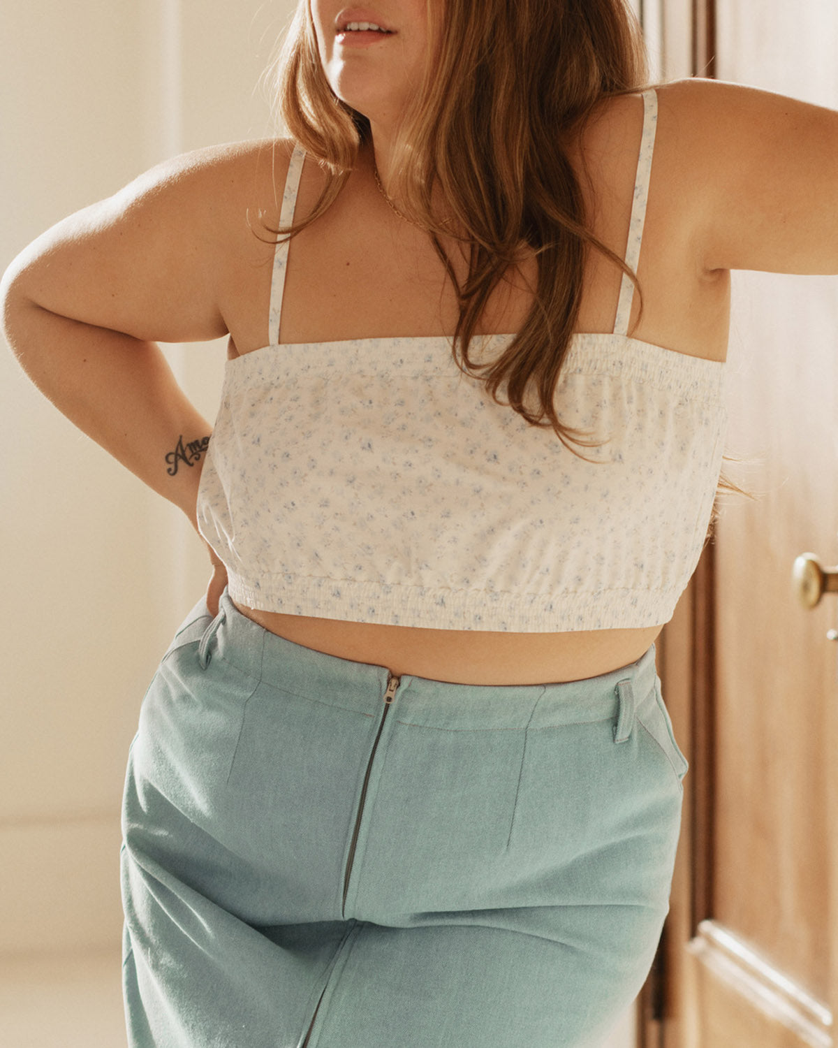 light blue floral cropped tank with adjustable straps