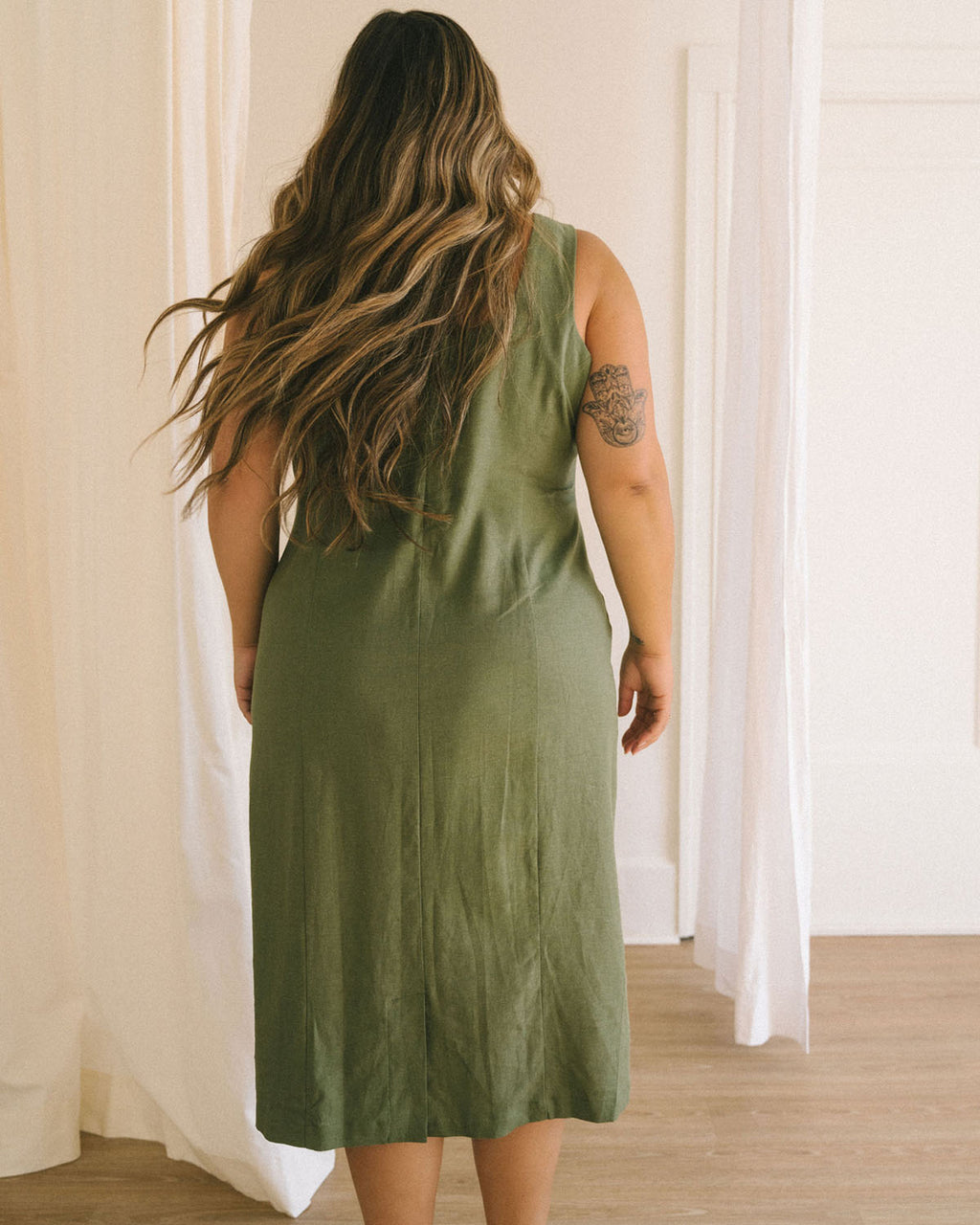 pistachio-coloured button front dress