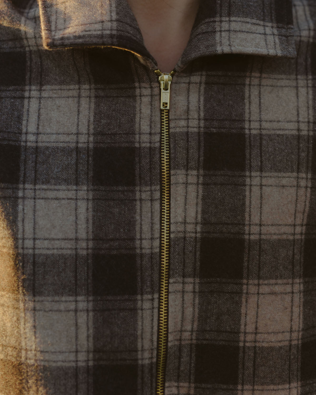 plaid wool coat with front zipper and pockets