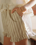 brown and beige striped shorts with elastic waistband