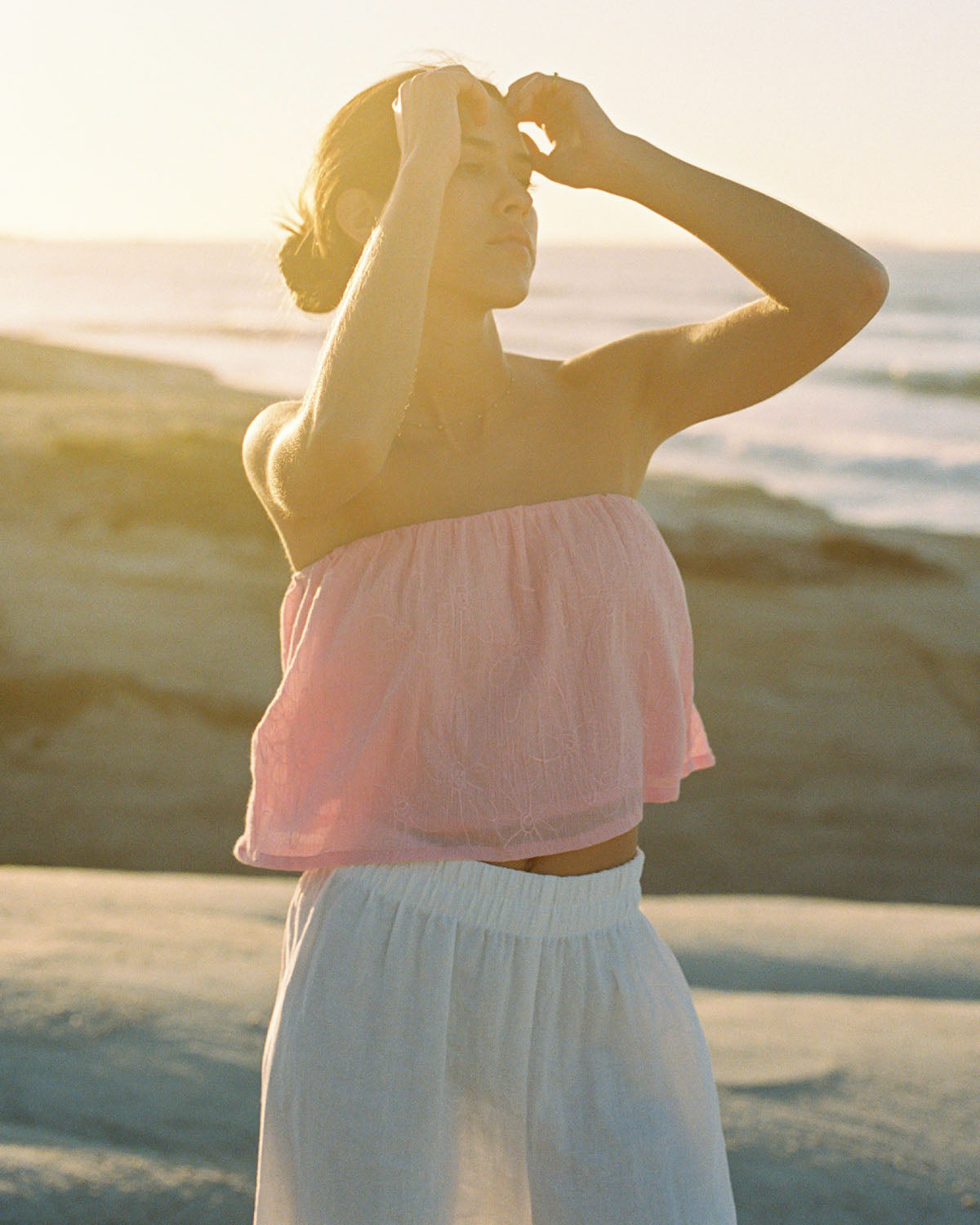 pink strapless embroidered top made from 100% cotton fabric