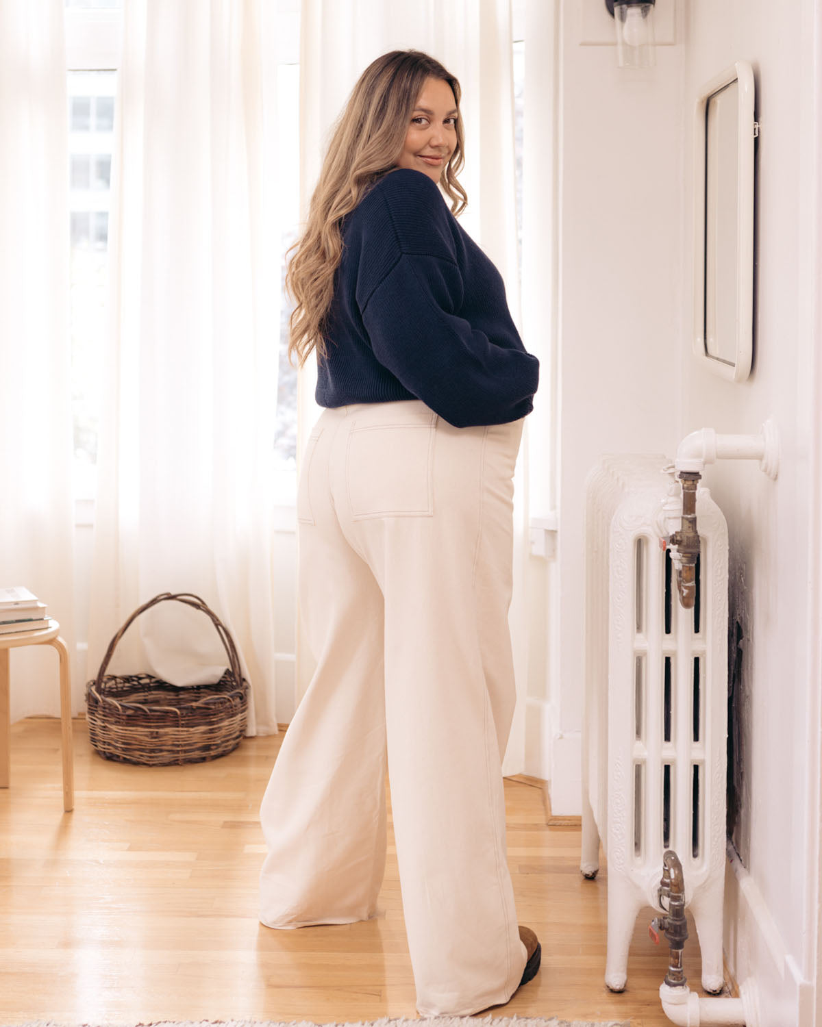 off-white high-waisted loose leg pants with raw hem