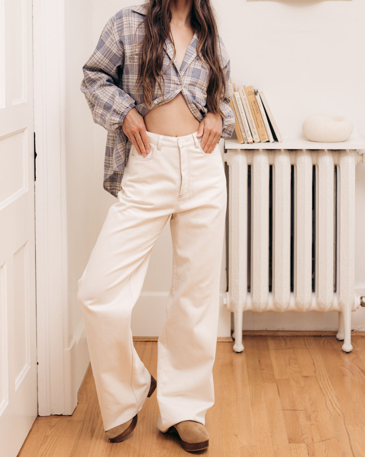 off-white high-waisted loose leg pants with raw hem