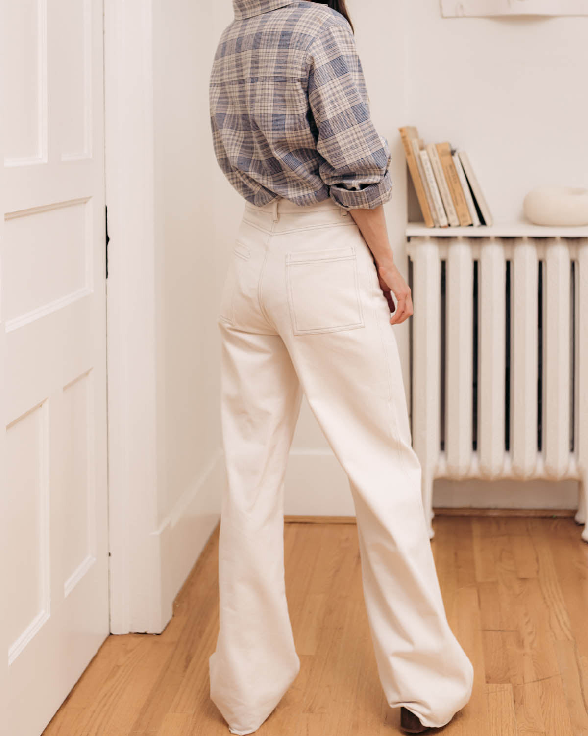 off-white high-waisted loose leg pants with raw hem